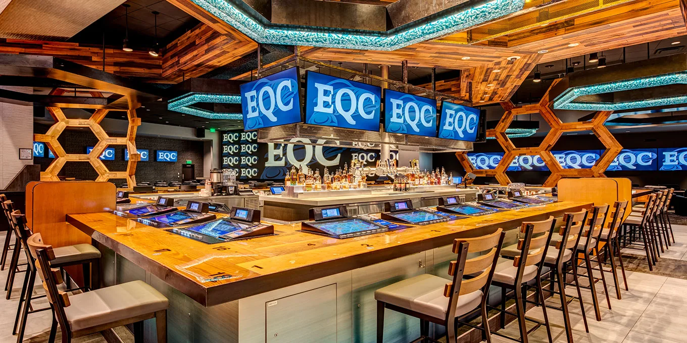 Sportsbook Bar corner bar with chairs and TV screens